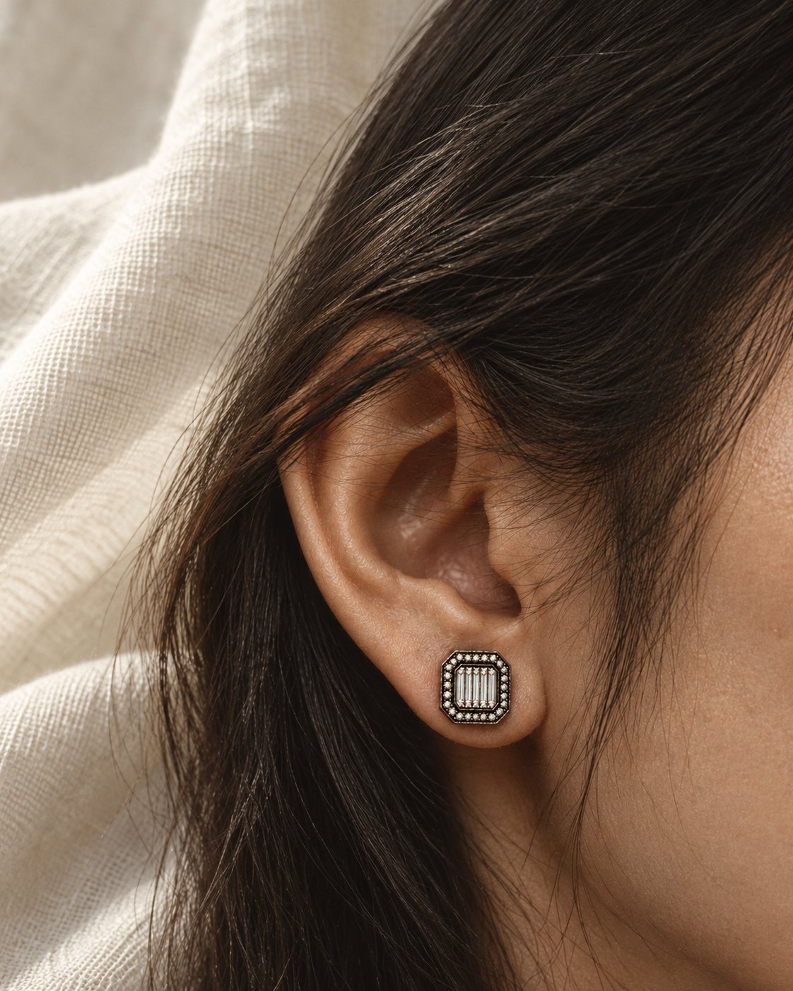 What I heard: INTERIM earring worn on the ear